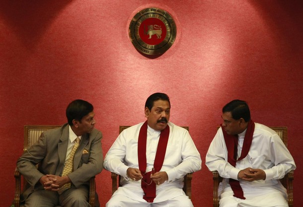 Rajapaksa, Cabraal, Basil Rajapaksa speak during the presentation of the Central Bank of Sri Lanka annual report 2010, in Colombo